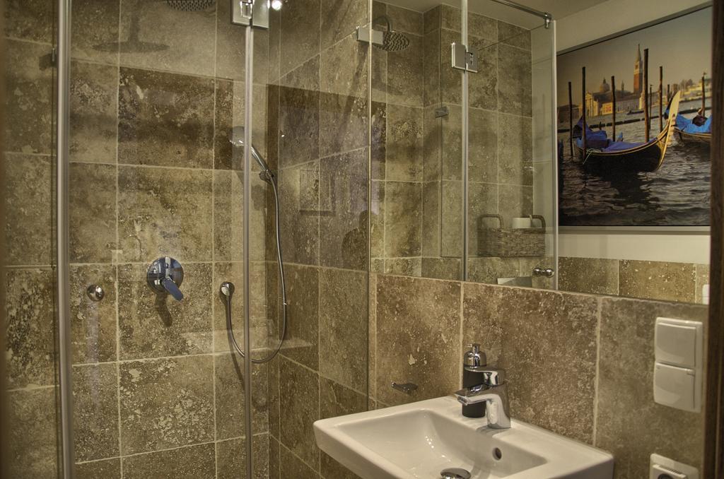 Tartaczna Deluxe Apartments กดัญสก์ ห้อง รูปภาพ