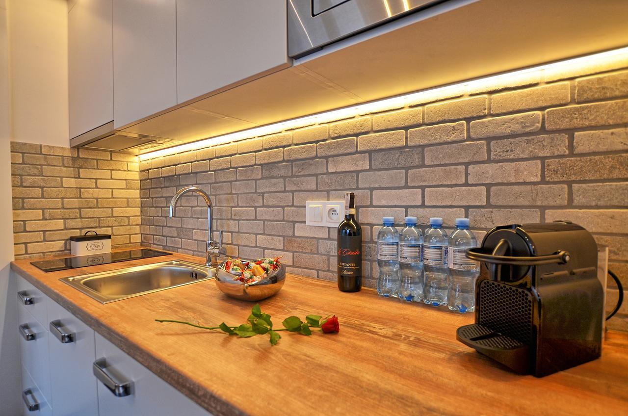 Tartaczna Deluxe Apartments กดัญสก์ ภายนอก รูปภาพ